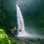 Edit Post Edit with Elementor Save draft Preview Publish Private Driver for Bali Waterfalls Tours with Hotel Pickup and Flexible Stops Bali is home to some of the island's most beautiful waterfalls, from hidden jungle cascades and canyon waterfalls to scenic falls tucked away in the mountains. The challenge is that many of these locations are spread across different parts of the island, often far from major tourist areas and not always straightforward to reach. Instead of spending your day navigating unfamiliar roads, searching for parking, or figuring out the next destination, you can explore Bali's waterfalls more comfortably with a private driver from Gede Bali Transport. This allows you to focus on the experience itself while the route, timing, and driving are taken care of for you. This block has encountered an error and cannot be previewed. Yes. A private driver is one of the easiest and most flexible ways to explore Bali's waterfalls, especially if you plan to visit multiple locations in a single day. Unlike fixed tours that follow a predetermined schedule, a private driver allows you to move at your own pace and build the day around the waterfalls you genuinely want to visit. Benefits of hiring a private driver for a Bali waterfall tour include: flexible itinerary based on your interests hotel or villa pickup and drop off multiple waterfall stops in one day local route knowledge and navigation full day exploration without driving yourself For many visitors, the convenience alone makes a private driver one of the most practical choices for exploring Bali's waterfall regions. Why Waterfalls Are Better with a Private Driver One of the biggest reasons travelers choose a private driver for waterfall tours is simple: Bali's waterfalls are not located in one area. Some of the most popular waterfalls are found around Ubud and Central Bali, while others are hidden deeper in North Bali or East Bali. Even when destinations appear close on a map, actual travel time can be much longer than expected because of road conditions, terrain, and traffic patterns. Waterfalls Are Spread Across Different Regions A typical waterfall itinerary can easily involve multiple regions of Bali, including: Central Bali waterfalls around Ubud North Bali waterfalls around Munduk and Wanagiri East Bali waterfalls near Sidemen and Karangasem Without proper route planning, it is surprisingly easy to spend more time driving than enjoying the waterfalls themselves. Distances Can Be Misleading Looking at a map often creates the impression that several waterfalls are close together. In reality, mountain roads, village roads, and winding terrain can significantly increase travel time between locations. A route that appears simple on Google Maps may take much longer once real driving conditions are considered. Parking and Access Are Not Always Straightforward Many waterfalls require a short trek after arrival, and parking areas can vary from one location to another. Some have organized facilities, while others are accessed through smaller local roads where familiarity with the area becomes helpful. Having a driver means you can simply focus on the visit itself rather than worrying about logistics between stops. Timing Makes a Big Difference Waterfall tours work best when the route is planned realistically. Visiting too many locations often leads to a rushed experience, while starting too late can limit how much you can comfortably see in a day. With local route knowledge and flexible scheduling, a private driver helps make the day flow more naturally, allowing you to spend more time enjoying the waterfalls and less time managing the journey between them. Popular Bali Waterfalls You Can Visit with a Private Driver One of the biggest advantages of hiring a private driver is the flexibility to build your day around the waterfalls that interest you most. Whether you want easy-access waterfalls near Ubud, hidden jungle locations, or a full day exploring North Bali, the itinerary can be adjusted to match your preferred pace and travel style. Here are some of the most popular waterfalls that work particularly well as part of a private driver experience. 1. Tegenungan Waterfall Located just outside Ubud, Tegenungan is often one of the easiest waterfalls to include in a day trip. Its convenient location makes it a popular first stop, especially if you are staying in Ubud, Sanur, or nearby areas. The waterfall is known for its powerful flow and relatively easy access compared to many other waterfalls in Bali. Because of its popularity, arriving earlier in the day often provides a more relaxed experience before larger crowds begin to arrive. This block has encountered an error and cannot be previewed. 2. Tibumana Waterfall Tibumana offers a completely different atmosphere. Surrounded by lush greenery and tropical jungle scenery, it feels quieter and more peaceful than many of Bali's busier waterfall destinations. The short walk to the waterfall is relatively easy, making it accessible for a wide range of travelers while still delivering the feeling of discovering a hidden natural retreat. Many visitors combine Tibumana with nearby waterfalls around Central Bali to create a slower and more scenic waterfall route. 3. Kanto Lampo Waterfall Kanto Lampo has become one of Bali's most photographed waterfalls thanks to its unique rock formations and cascading water flowing across multiple tiers. Unlike taller waterfalls that plunge directly into a pool below, Kanto Lampo creates a dramatic backdrop that is especially popular for photography. Because access is relatively straightforward, it works extremely well as part of an Ubud waterfall route where several locations can be visited comfortably within a single day. 4. Tukad Cepung Waterfall Tukad Cepung is one of Bali's most unique waterfall experiences. Hidden inside a cave-like canyon, the waterfall creates an entirely different atmosphere compared to more open waterfall locations. Timing plays an important role here. Morning light often creates the most beautiful conditions as sunlight filters through the canyon opening and illuminates the waterfall. If you looking for something distinctive rather than another traditional waterfall stop, Tukad Cepung is often one of the highlights of the day. 5. Leke Leke Waterfall For those searching for a quieter waterfall experience, Leke Leke is often considered one of Bali's hidden gems. The surrounding jungle scenery and narrower waterfall profile create a more secluded atmosphere, making it particularly appealing for nature lovers and photographers. Because it is located away from some of Bali's busiest tourism areas, Leke Leke is commonly included in routes focused on less crowded destinations. 6. Banyumala Waterfall Banyumala is one of the most beautiful waterfalls in North Bali and is often considered a destination worth building an entire day around. The journey takes longer compared to waterfalls around Ubud, but the reward is a more pristine environment, fewer crowds, and stunning natural scenery. Because of the driving distance involved, Banyumala is usually best visited as part of a dedicated North Bali waterfall route with a private driver managing the longer travel logistics throughout the day. Bali Waterfall Tour Private Driver Price The cost of a private driver for a Bali waterfall tour generally depends on the vehicle type, group size, and level of comfort you prefer throughout the day. With Gede Bali Transport, you can choose from several vehicle options based on your travel needs while enjoying the flexibility to visit multiple waterfalls at your own pace. Vehicle Full Day Price Avanza IDR 800K Innova Reborn IDR 1.1M Hiace 14 Seater IDR 1.55M ﻿ The service includes: private driver fuel hotel or villa pickup flexible waterfall stops customized route planning Because every waterfall itinerary can be adjusted based on your interests, a private driver often provides much greater flexibility compared to joining a fixed group tour. Why Choose Gede Bali Transport for a Waterfall Tour A waterfall tour is not simply about moving from one waterfall to another. The experience often depends on choosing the right route, managing travel time efficiently, and knowing how to combine destinations without making the day feel rushed. This is where local knowledge can make a significant difference. This block has encountered an error and cannot be previewed. 1. Local Waterfall Knowledge Not every waterfall offers the same experience. Some are best visited early in the morning, while others are more enjoyable later in the day. Having a driver familiar with Bali's waterfall regions helps create a smoother and more enjoyable itinerary. 2. Smarter Route Optimization Many waterfalls look close together on a map but can require longer driving times than expected. Proper route planning helps reduce unnecessary backtracking and allows you to spend more time exploring rather than sitting in the vehicle. 3. Flexible Itinerary Unlike fixed tours that follow a strict schedule, a private driver allows you to adjust the day according to your preferences. If you want to spend more time at a particular waterfall, stop for lunch, or add another destination along the way, the itinerary can remain flexible. 4. English Speaking Driver Clear communication makes the experience easier, especially when discussing route adjustments, stop durations, or additional destinations throughout the day. 5. Comfortable Vehicles Whether you are traveling as a couple, family, or larger group, comfortable transportation becomes important when visiting multiple waterfall locations across Bali. 6. No Fixed Schedule One of the biggest advantages of a private driver is freedom. You are not following a tour bus timetable. The day moves according to your preferred pace and travel style. Explore Bali Waterfalls at Your Own Pace The best waterfall experiences in Bali rarely come from rushing through a fixed schedule. With a private driver, you have the flexibility to visit the waterfalls that interest you most, spend more time where you want, and enjoy the journey without worrying about navigation, parking, or route planning. Whether you are exploring the waterfalls around Ubud, discovering hidden gems in Central Bali, or heading north for a full day adventure, a private driver allows the day to feel more relaxed and enjoyable from start to finish. Book your Bali waterfall tour with Gede Bali Transport and discover more waterfalls with less hassle and more flexibility. BOOK YOUR BALI PRIVATE DRIVER NOW! Frequently Asqed Questions Is a private driver worth it for a Bali waterfall tour? Yes. A private driver makes it easier to visit multiple waterfalls in one day while avoiding navigation stress, parking issues, and unnecessary route planning.\ How much does a Bali waterfall tour with a private driver cost? Pricing typically starts from IDR 800K for a full day private driver, depending on the vehicle type and group size. Which waterfalls can I visit in one day? Many travelers combine waterfalls such as Tegenungan, Kanto Lampo, Tibumana, and Tukad Cepung in a single day. Other routes can focus on North Bali or hidden waterfall destinations. How long is a Bali waterfall tour? Most waterfall tours take between 8 and 12 hours depending on the route, driving distance, and number of stops included in the itinerary. What should I bring to a waterfall tour? Comfortable footwear, a change of clothes, a towel, drinking water, sunscreen, and a waterproof phone case are usually recommended. Can I customize my waterfall itinerary? Yes. One of the main benefits of hiring a private driver is the ability to customize the route based on the waterfalls and attractions you want to visit. Is hotel pickup included? Yes. Gede Bali Transport includes hotel or villa pickup and drop off as part of the private driver service. ﻿ Move upMove downToggle panel: Yoast SEO SEO Readability Schema Social Focus keyphraseHelp on choosing the perfect focus keyphrase(Opens in a new browser tab) waterfalls with private driver Get related keyphrases(Opens in a new browser window) Google preview Preview as: Mobile resultDesktop result Url preview:gedebalitransport.com › bali-waterfall-tour-with-private-driverSEO title preview: Private Driver for Bali Waterfalls Tours with Hotel Pickup and Flexible Stops - ... Meta description preview: May 30, 2026 － Explore multiple Bali waterfalls in one day with a private driver who handles the route, timing, and transportation while you enjoy the experience. SEO title Insert variable Title Page Separator Site title Slug bali-waterfall-tour-with-private-driver Meta description Insert variable Explore multiple Bali waterfalls in one day with a private driver who handles the route, timing, and transportation while you enjoy the experience. SEO analysisOK waterfalls with private driver + Add synonyms + Add related keyphrase Did you know Yoast SEO Premium also analyzes the different word forms of your keyphrase, like plurals and past tenses? Go Premium!(Opens in a new browser tab) Analysis results Problems (4) Images: No images appear on this page. Add some! Keyphrase in introduction: Your keyphrase or its synonyms do not appear in the first paragraph. Make sure the topic is clear immediately. Keyphrase in subheading: Use more keyphrases or synonyms in your H2 and H3 subheadings! SEO title width: The SEO title is wider than the viewable limit. Try to make it shorter. Improvements (2) Meta description length: The meta description is over 156 characters. To ensure the entire description will be visible, you should reduce the length! Keyphrase in title: Does not contain the exact match. Try to write the exact match of your keyphrase in the SEO title and put it at the beginning of the title. Good results (8) Outbound links: Good job! Internal links: You have enough internal links. Good job! Keyphrase length: Good job! Keyphrase density: The focus keyphrase was found 13 times. This is great! Keyphrase in meta description: Keyphrase or synonym appear in the meta description. Well done! Previously used keyphrase: You've not used this keyphrase before, very good. Text length: The text contains 1868 words. Good job! Keyphrase in slug: More than half of your keyphrase appears in the slug. That's great! Add related keyphrase Track SEO performance Cornerstone content Advanced Post Block Status & visibility Visibility Public Publish Immediately Post Format Standard Stick to the top of the blog Pending review Author I Gede Suartika Move to trash Template Yoast SEO Readability analysis: Needs improvement SEO analysis: OK Improve your post with Yoast SEO Permalink Categories Search Categories Uncategorized About Bali Bali Wedding Bali Airport Guide Bali Resort Bali Tour Bali Transport Guide Bali Transport Service Bali Travel Guide Bali Travel Regulation Bali Wedding Covid-19 Add New Category Tags Add New Tag Gede Bali Transport (1 of 2)Gede Bali Transport Bali Private Driver (2 of 2)Bali Private Driver Separate with commas or the Enter key. Most Used Gede Bali TransportBali Travel GuideBali Private DriverBali Bus RentalBus Charter IndonesiaBali Airport TransportLuxury Bus BaliGroup Travel BaliBali Transport RentalBali Bus Hire Featured image Set featured image Show featured image in the posts lists only, but hide it in the single post view. Excerpt Write an excerpt (optional) Explore multiple Bali waterfalls in one day with a private driver who handles the route, timing, and transportation while you enjoy the experience. Learn more about manual excerpts(opens in a new tab) Discussion Move upMove downToggle panel: LiteSpeed Disable Cache Disable Image Lazyload Disable VPI Viewport Images Viewport Images - Mobile Learn More Open publish panel Post NotificationsTag added Close dialog Featured image Upload filesMedia Library Filter mediaFilter by type Images Filter by date All dates Search Media list Showing 81 of 717 media items Load more Attachment Details Private-Driver-for-Bali-Waterfalls-Tours-with-Hotel-Pickup-and-Flexible-Stops.webp May 30, 2026 83 KB 1600 by 1066 pixels Edit Image Delete permanently Optimize your images to enhance site performance by using Image Optimizer. Install Image Optimizer! Dismiss this notice. Alt Text Learn how to describe the purpose of the image(opens in a new tab). Leave empty if the image is purely decorative.Title Private Driver for Bali Waterfalls Tours with Hotel Pickup and Flexible Stops Caption Description File URL: https://gedebalitransport.com/wp-content/uploads/2026/05/Private-Driver-for-Bali-Waterfalls-Tours-with-Hotel-Pickup-and-Flexible-Stops.webp Copy URL to clipboard Selected media actionsSet featured image No file chosen